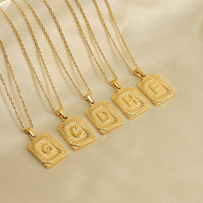 gold letter pendant necklace