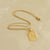 gold letter pendant necklace