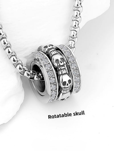 Rotatable skull necklace